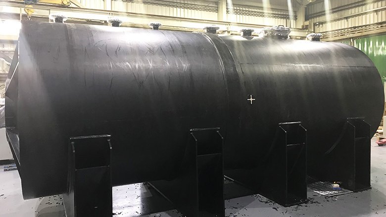 Finished tank including connection flanges and manhole Finished tank including connection flanges and manhole